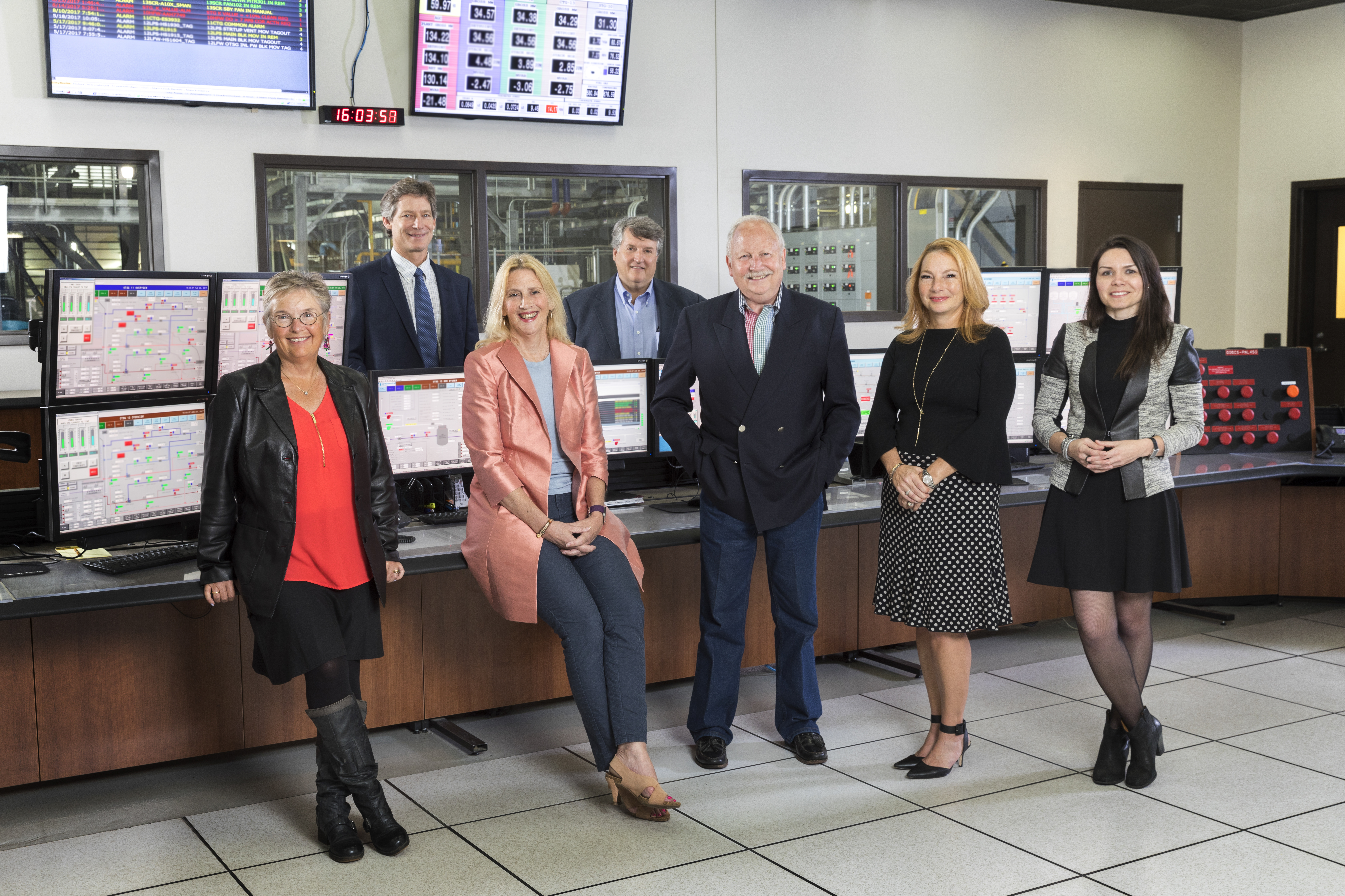 Board of directors in control room